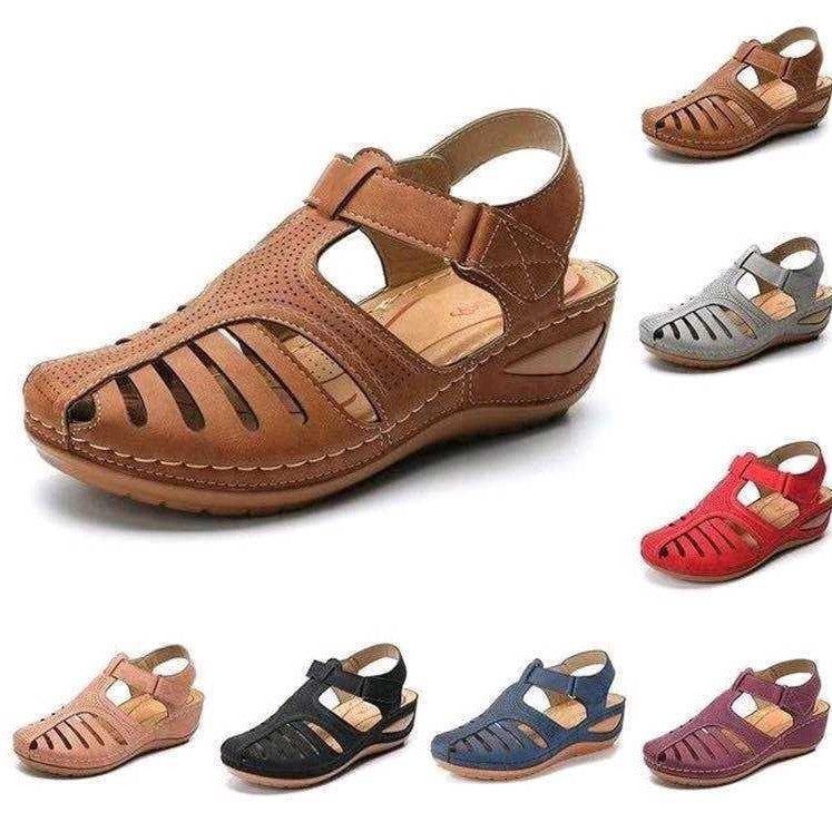 Sandals with flat bottomed slopes and hollowed out heels