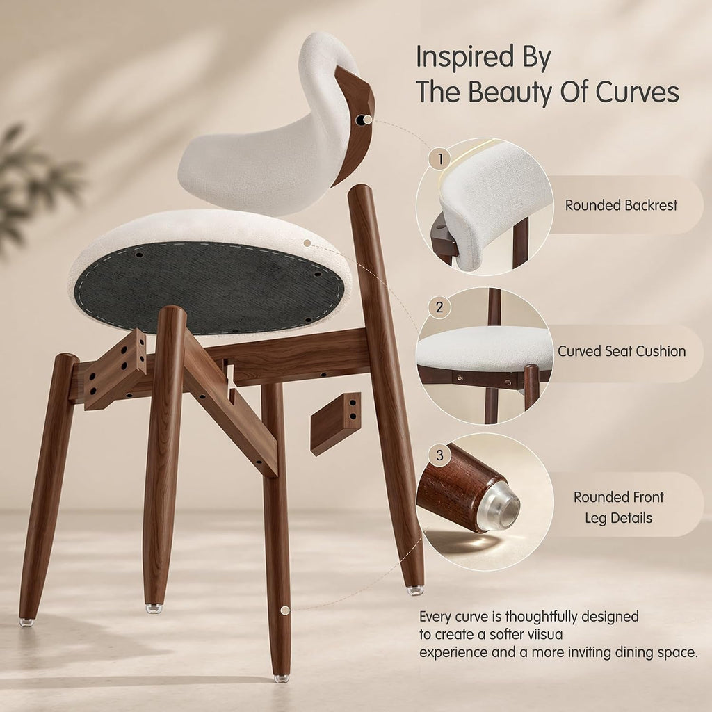 Four Cream Upholstered Dining Chairs Curved Backrests