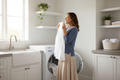 Woman Smelling Fresh White Shirt from Dryer